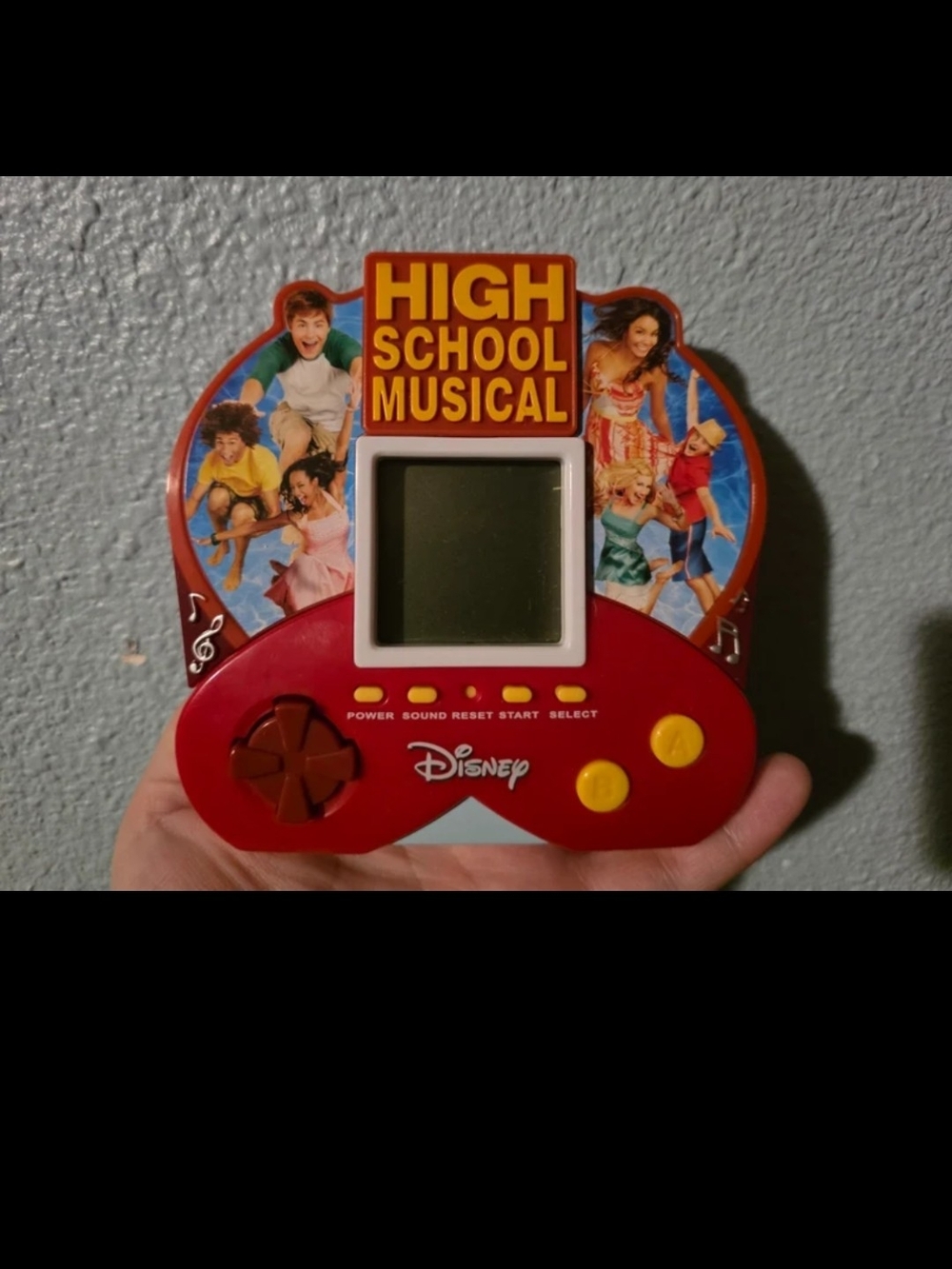 Disney High School Musical Red Handheld Game with Yellow Buttons